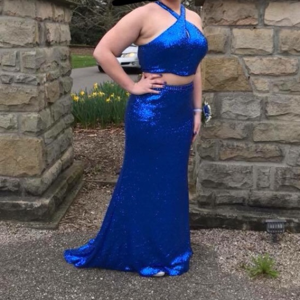 Royal blue, all-sequin, open back prom dress.